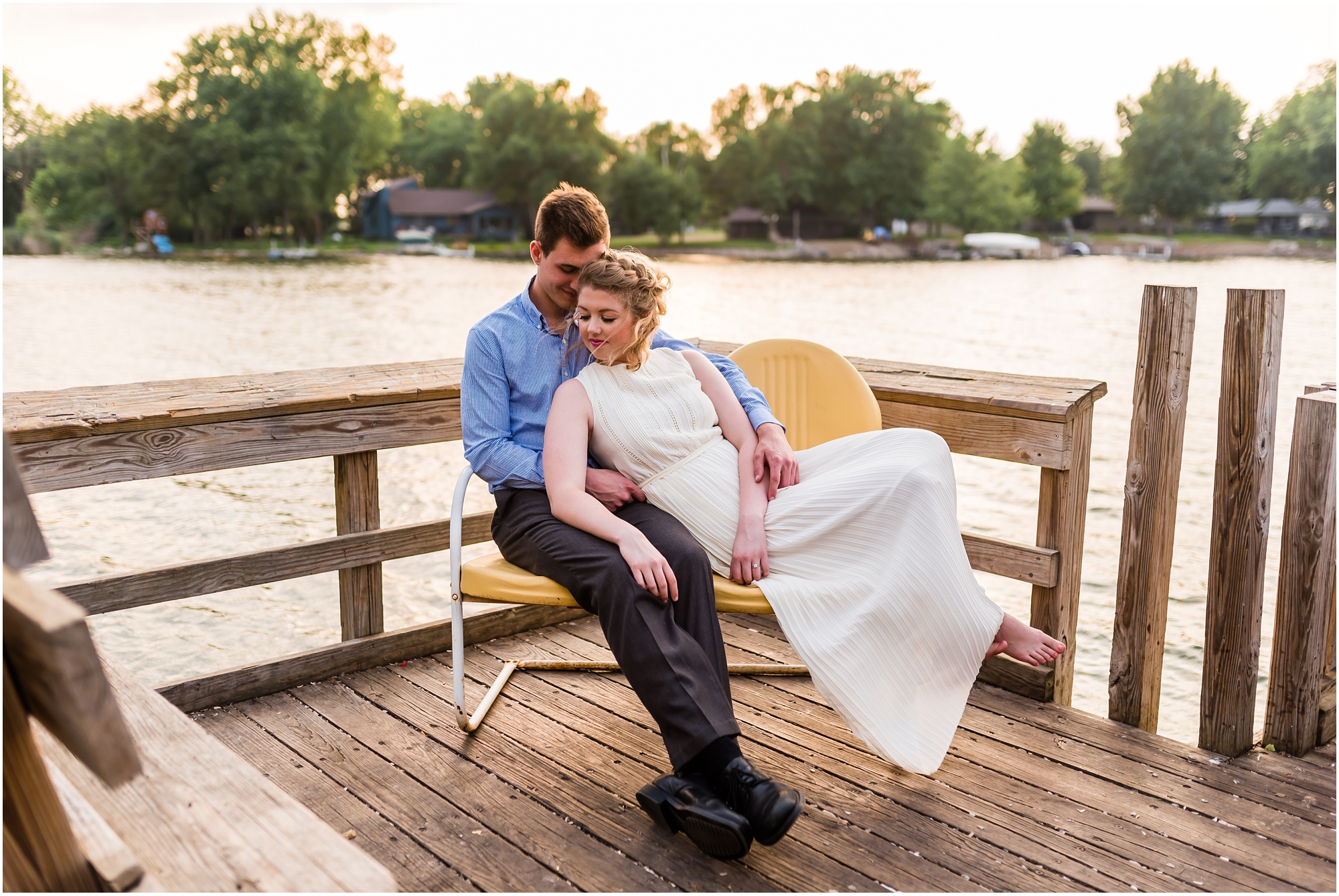 couple on bench on fishing dock