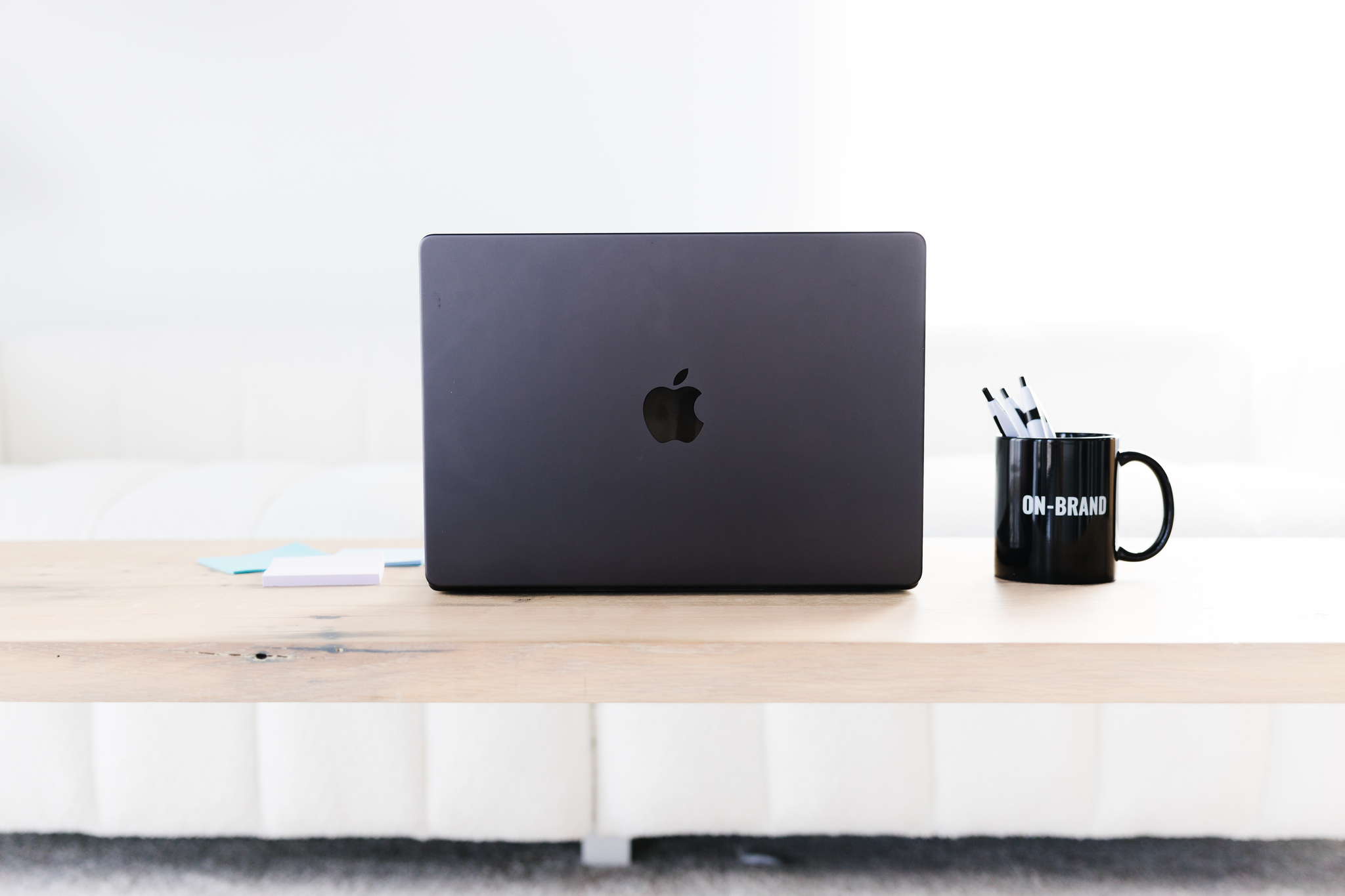 Maddie computer on desk, for working on marketing strategies